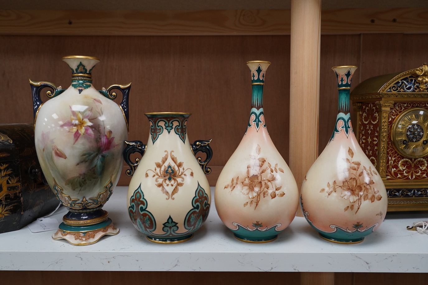 Hadley's Worcester: a pair of vases and two others, tallest 21.5cm. Condition - mostly good, largest vase has two chips to inner upper rim, areas of wear to gilding